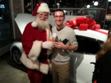 Not all Santa's are created equal. This one likes Tesla and Scotch!